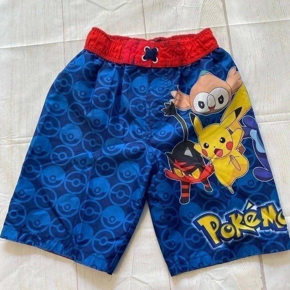 Boys Pokémon branded swim trunks. Size M